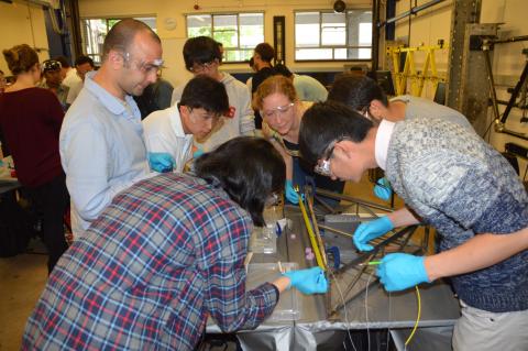 APESS 2016 students learning instrumentation during a demonstration in the lab. 