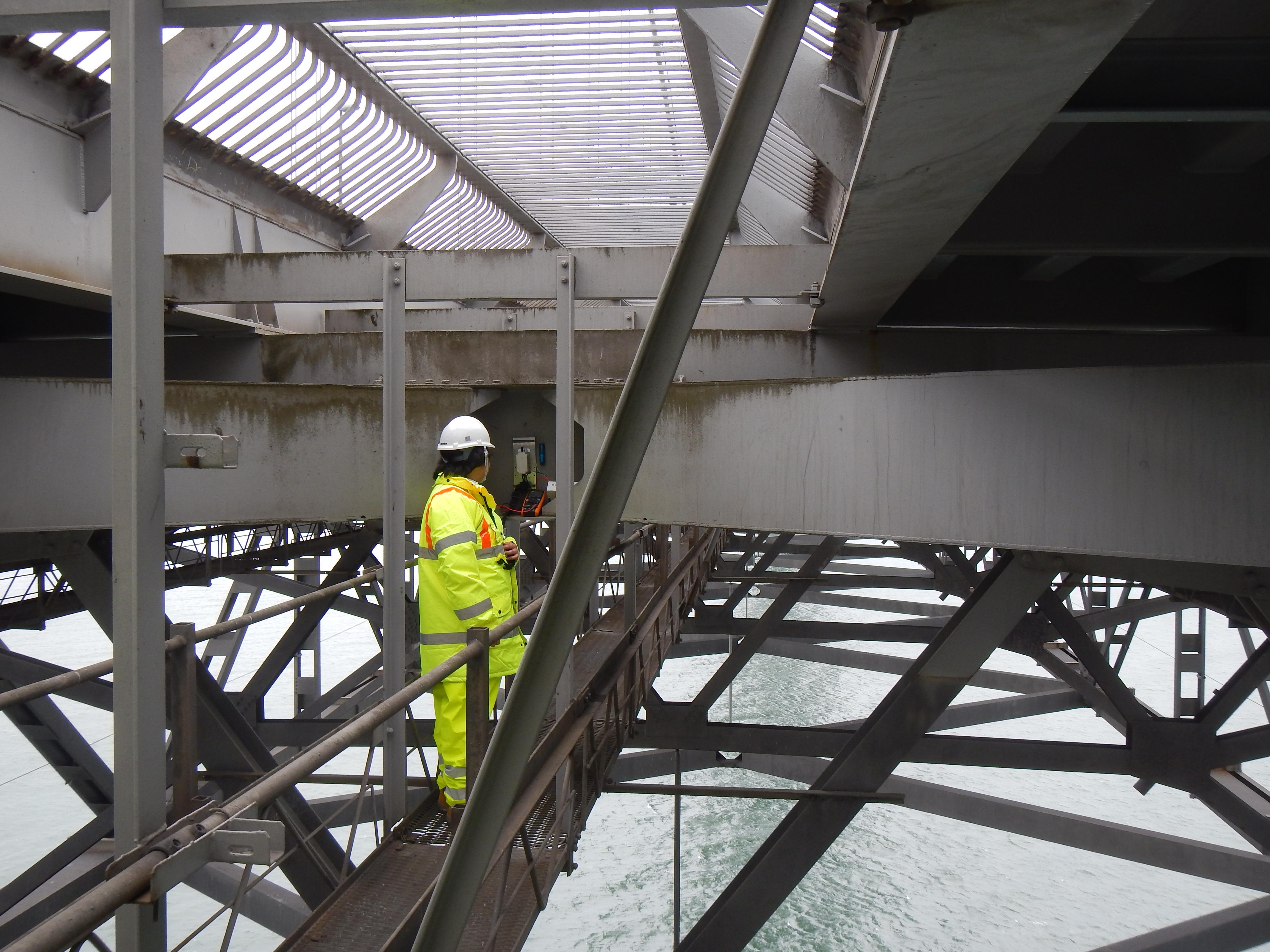 A CSIC vibration energy harvesting device being tested by Dr Yu Jia on the Forth Road Bridge