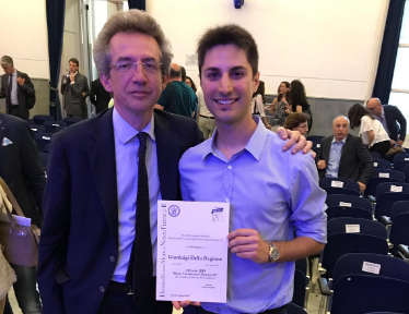 Gianluigi Della Ragione receiving award